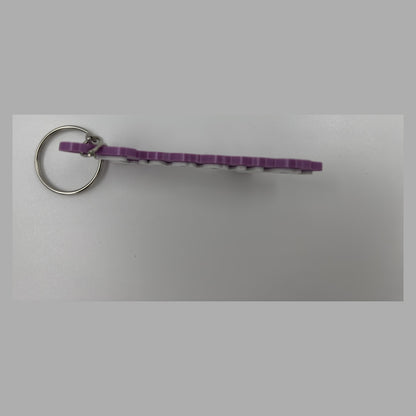 Cursive name keychain — photograph of the printed piece
