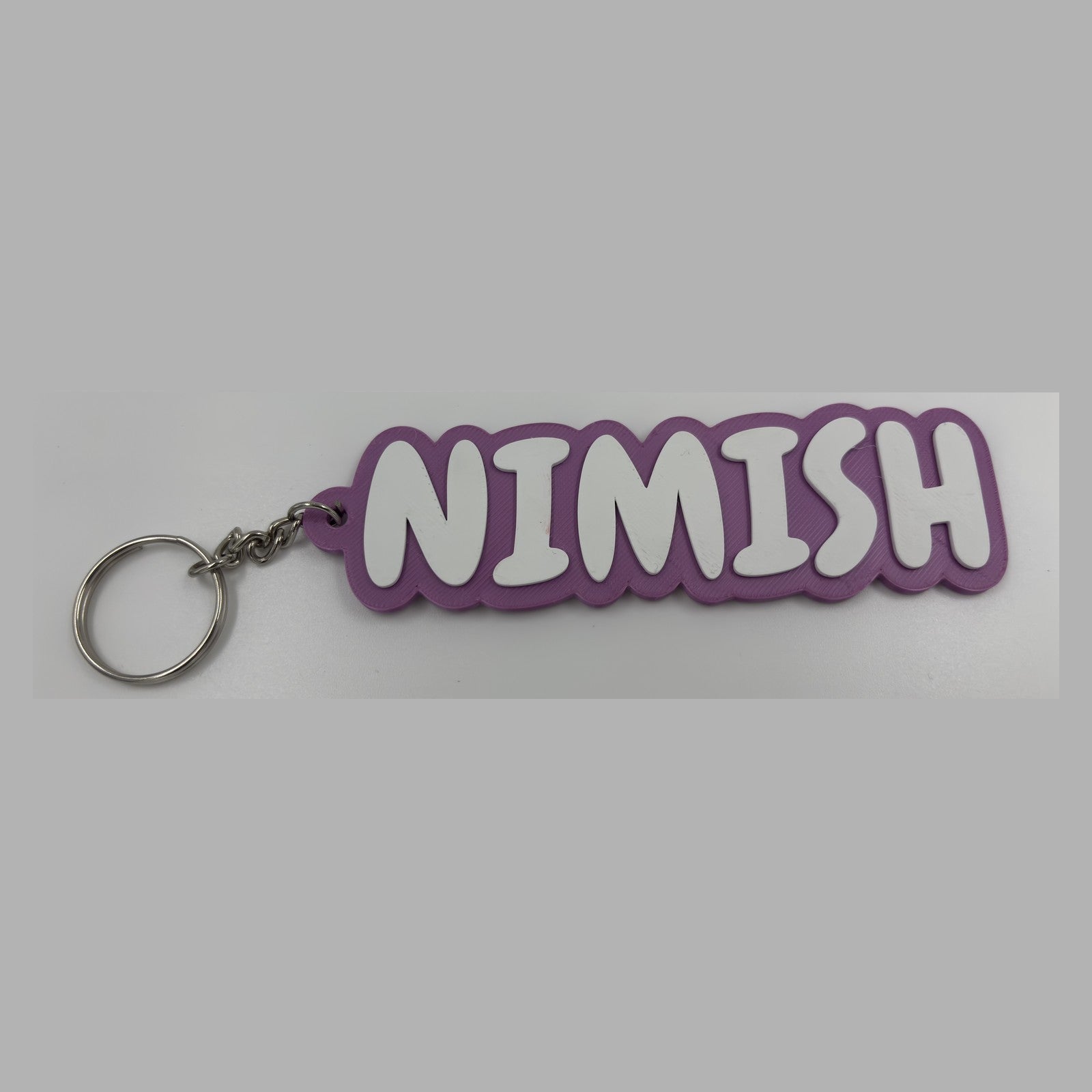 Block letter name keychain — photograph of the printed piece