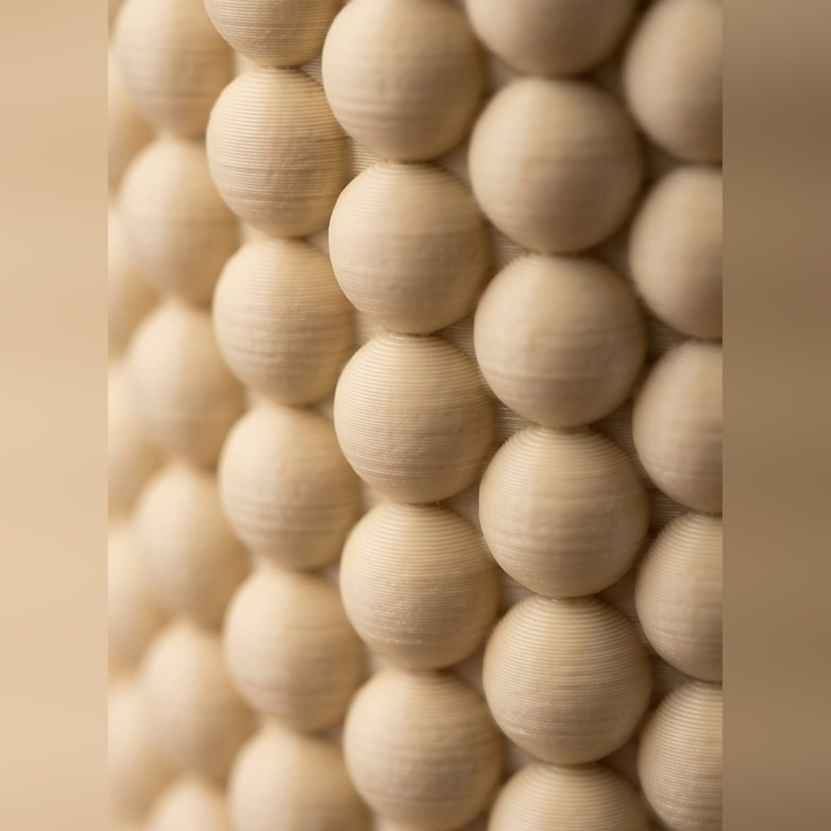 Close-up of the beaded bobble texture wrapping the pen pot
