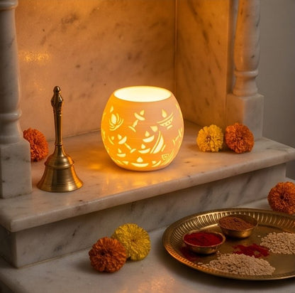 Glowing Diwali Lamp — Round — in a home mandir