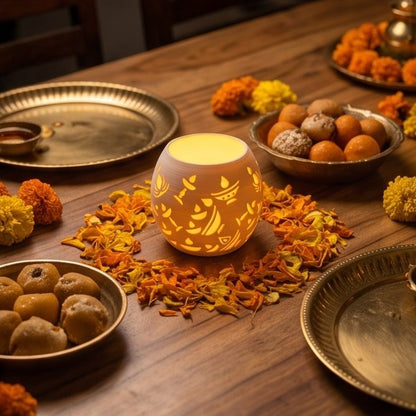 Glowing Diwali Lamp — Round — on a festive dining table