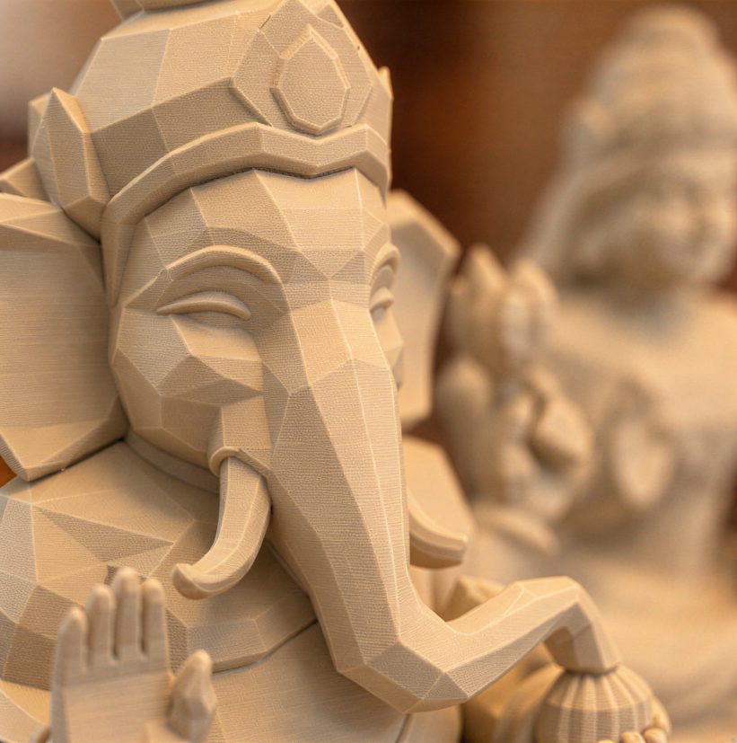 Lakshmi Ganesh on Base — close-up of the faceted Ganesha