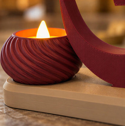 Small OM Stand with Twin Diyas — close-up of the swirl diya